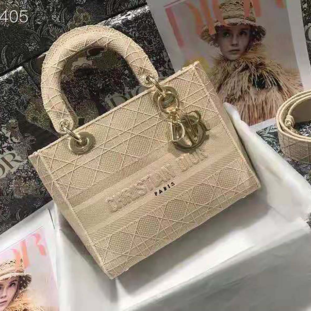 Side angle showing silver hardware on Dior Medium Lady D-Lite Bag Sandy