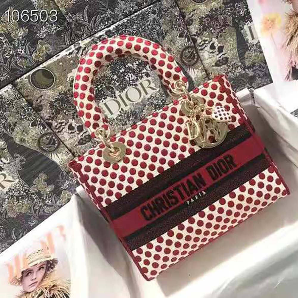 Close-up of red Dior dots embroidery on Dior Medium Lady D-Lite bag