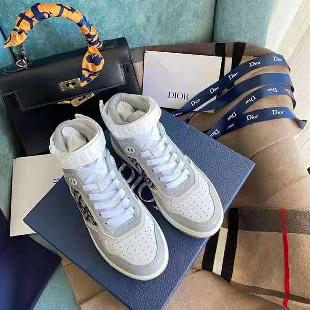 Close-up detail of silver hardware on Dior Men B27 High-Top Sneaker