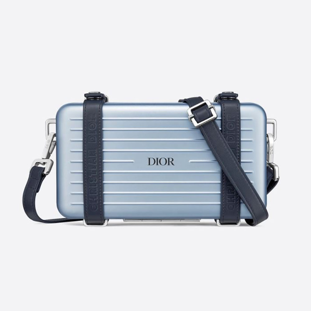 Front close-up of Dior Men Dior and Rimowa Personal Clutch in blue