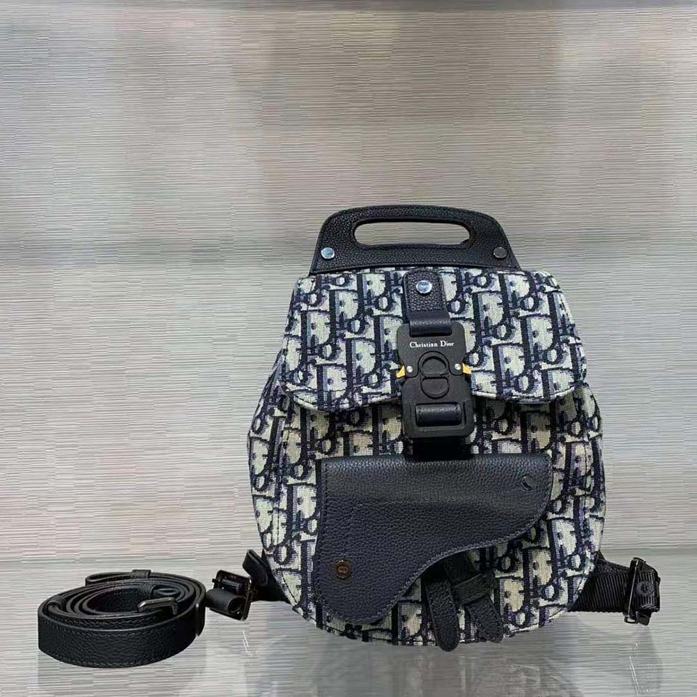 Close-up detail of Dior Oblique jacquard fabric and silver hardware