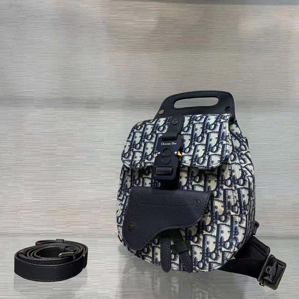 Back angle showing adjustable straps on Dior Men Mini Saddle Backpack