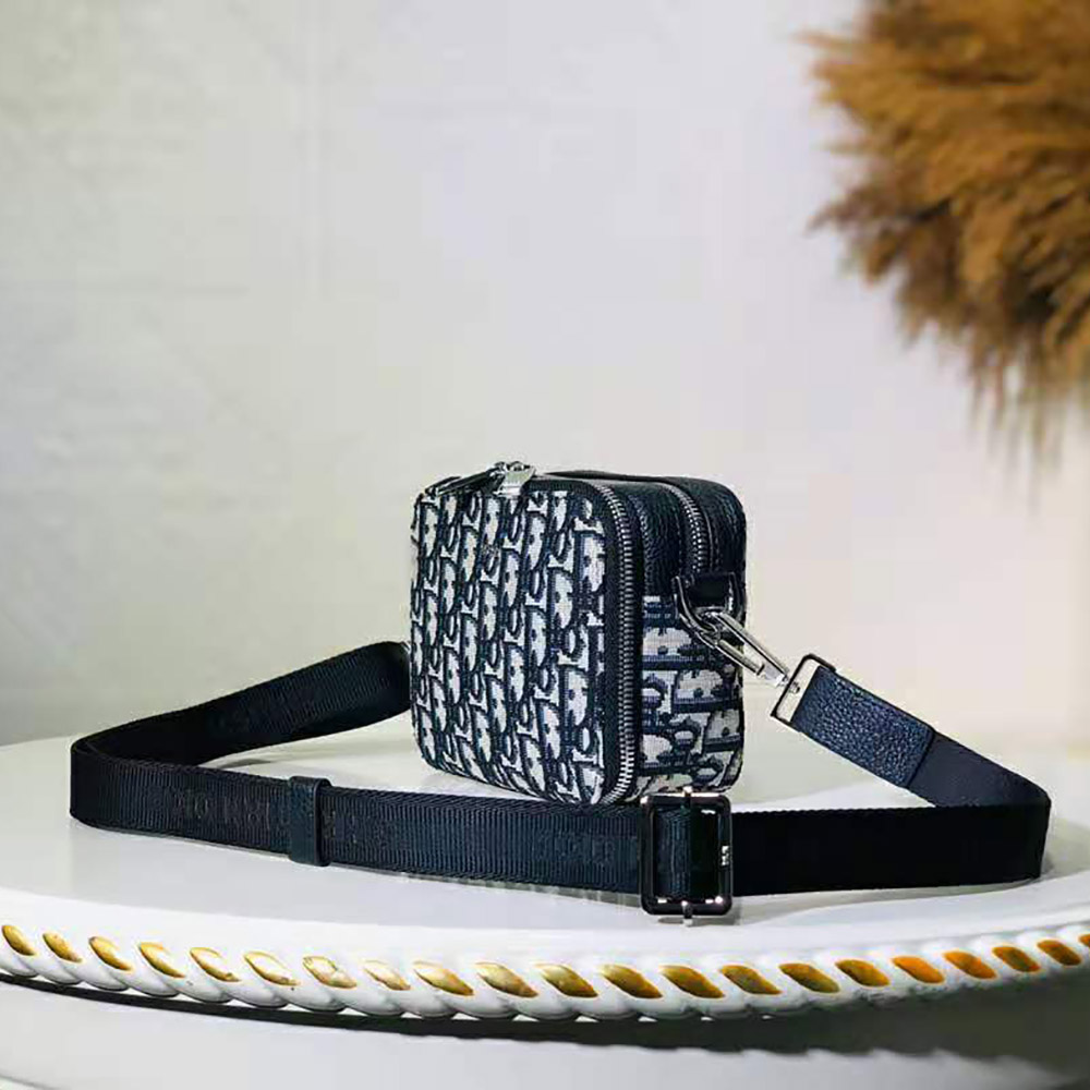 Side angle showing adjustable strap of Dior Men Pouch with Shoulder Strap