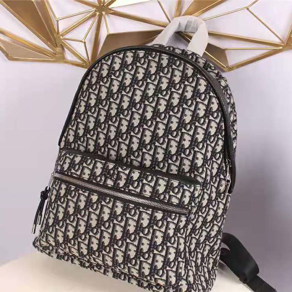 Side profile showing adjustable strap on Dior Men Rider Backpack