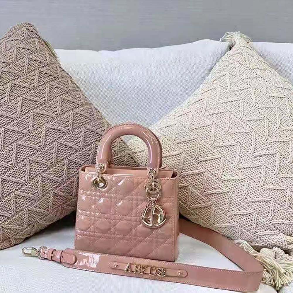 Close-up of gold-tone hardware on Dior Small Lady Dior Bag Patent Calfskin