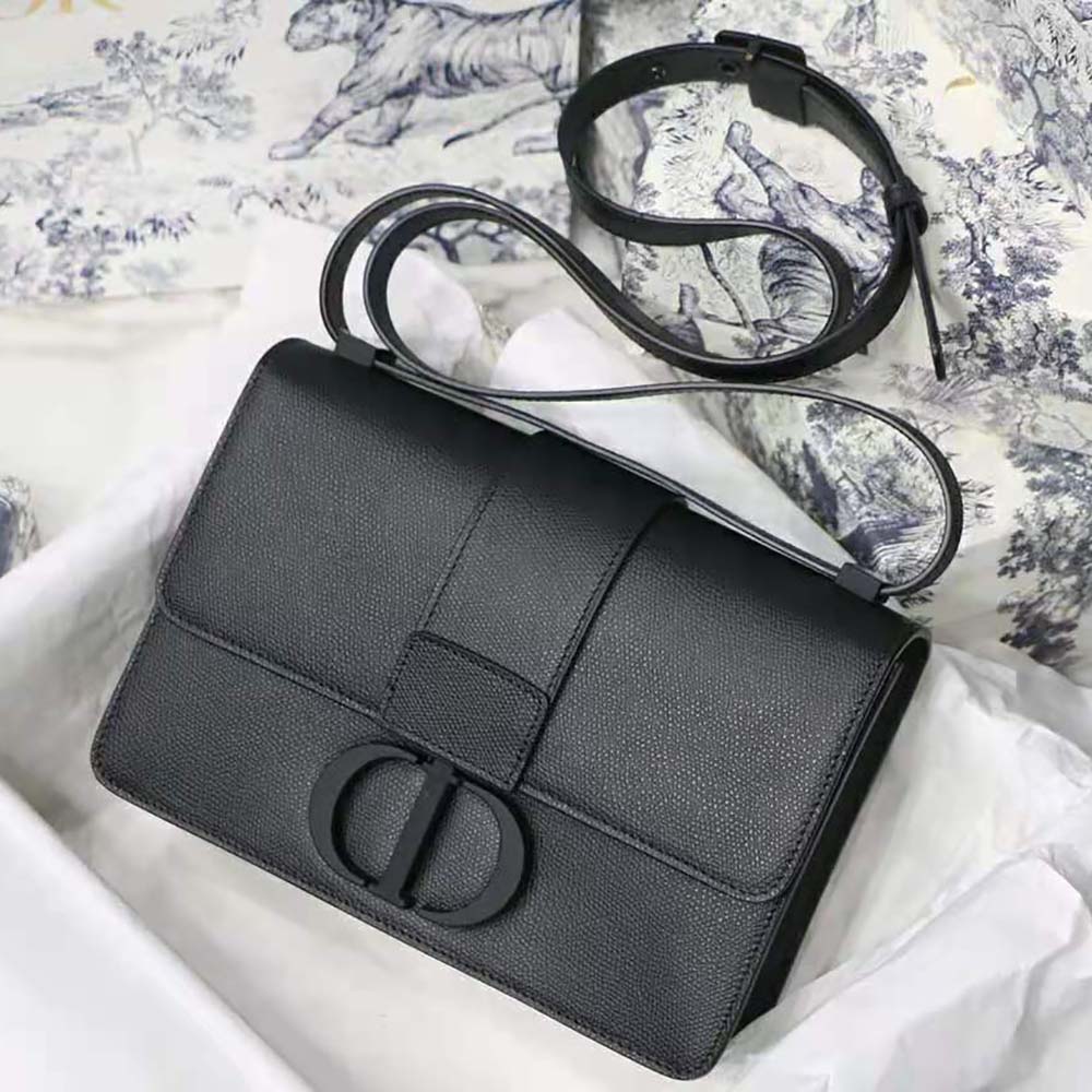 Close-up on silver Dior hardware of 30 Montaigne Bag in black ultramatte leather