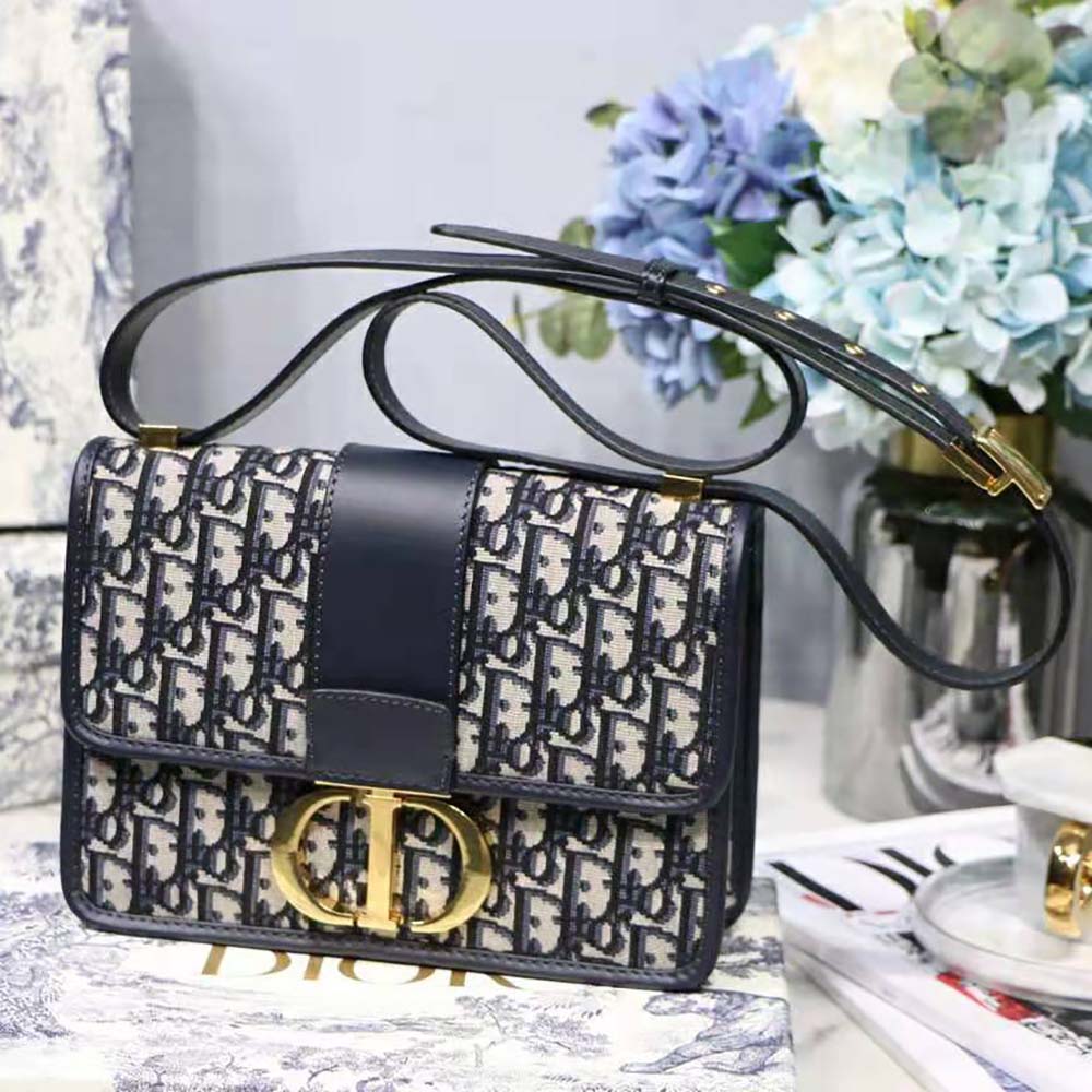 Close-up of gold-tone clasp on Dior Women 30 Montaigne Bag