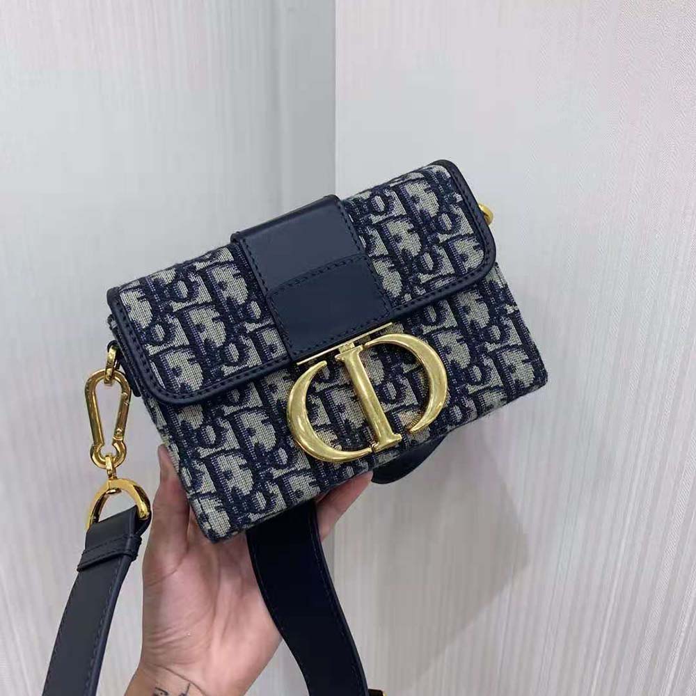Side profile showing structured silhouette of Dior Women 30 Montaigne Box Bag Blue