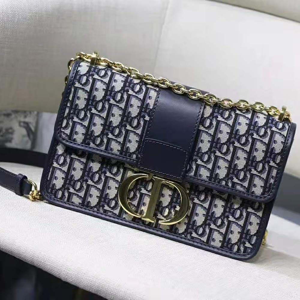 Close-up of silver Dior engraved clasp on 30 Montaigne Chain Bag