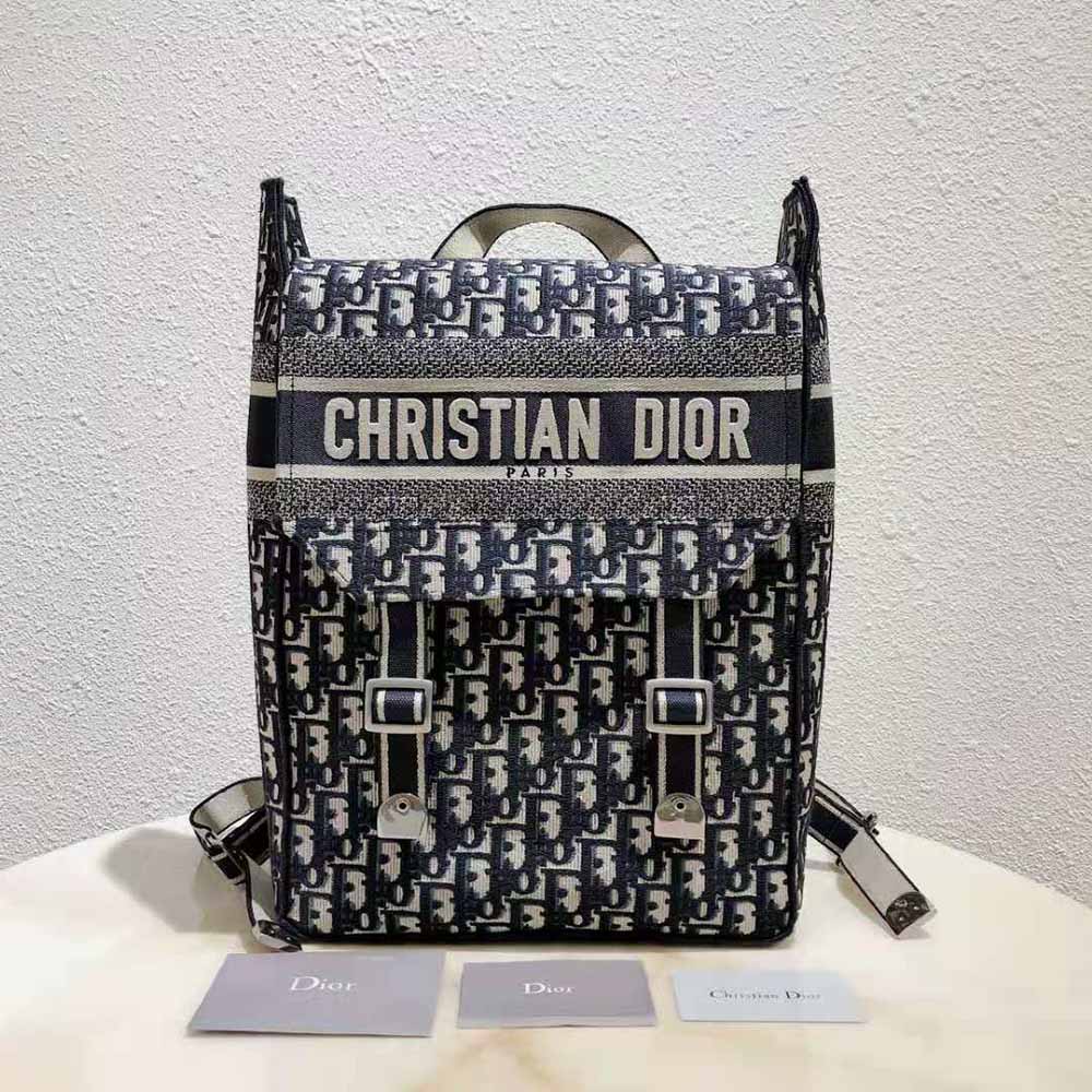 Close-up of silver-tone hardware and zipper on Dior Women Backpack Blue Dior Oblique Embroidery