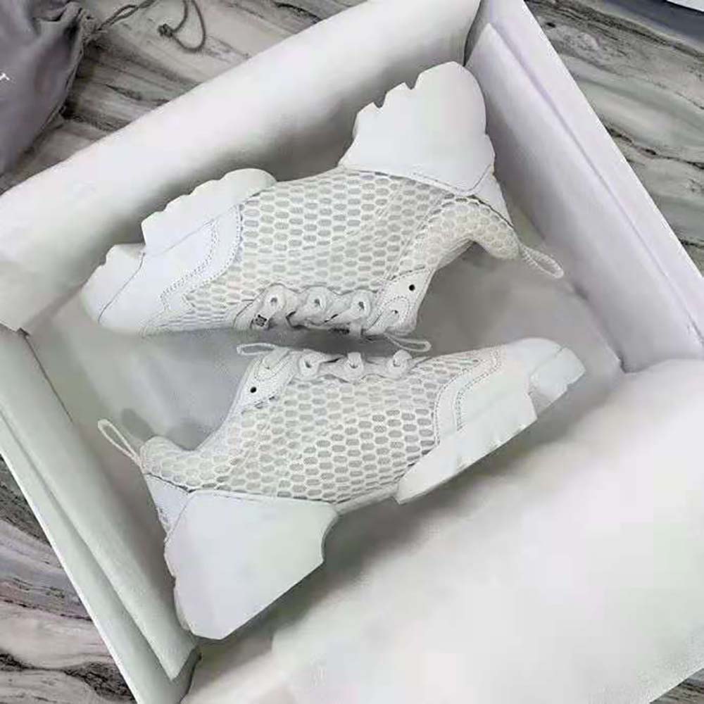 Close-up of Dior Women D-Connect Sneaker-White leather and mesh details