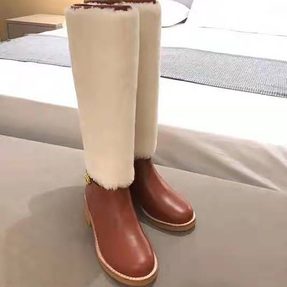 Top-down view showcasing dark tan leather and mid-calf silhouette