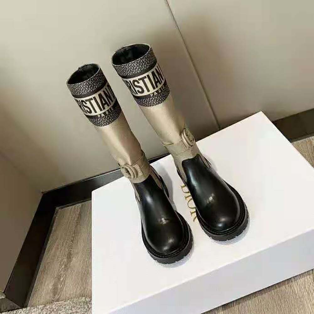 Close-up of Dior engraved metal eyelets and lace-up detail on D-Major Boot