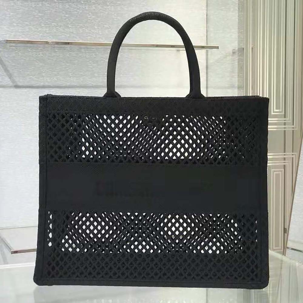Side angle highlighting tote’s spacious rectangular silhouette