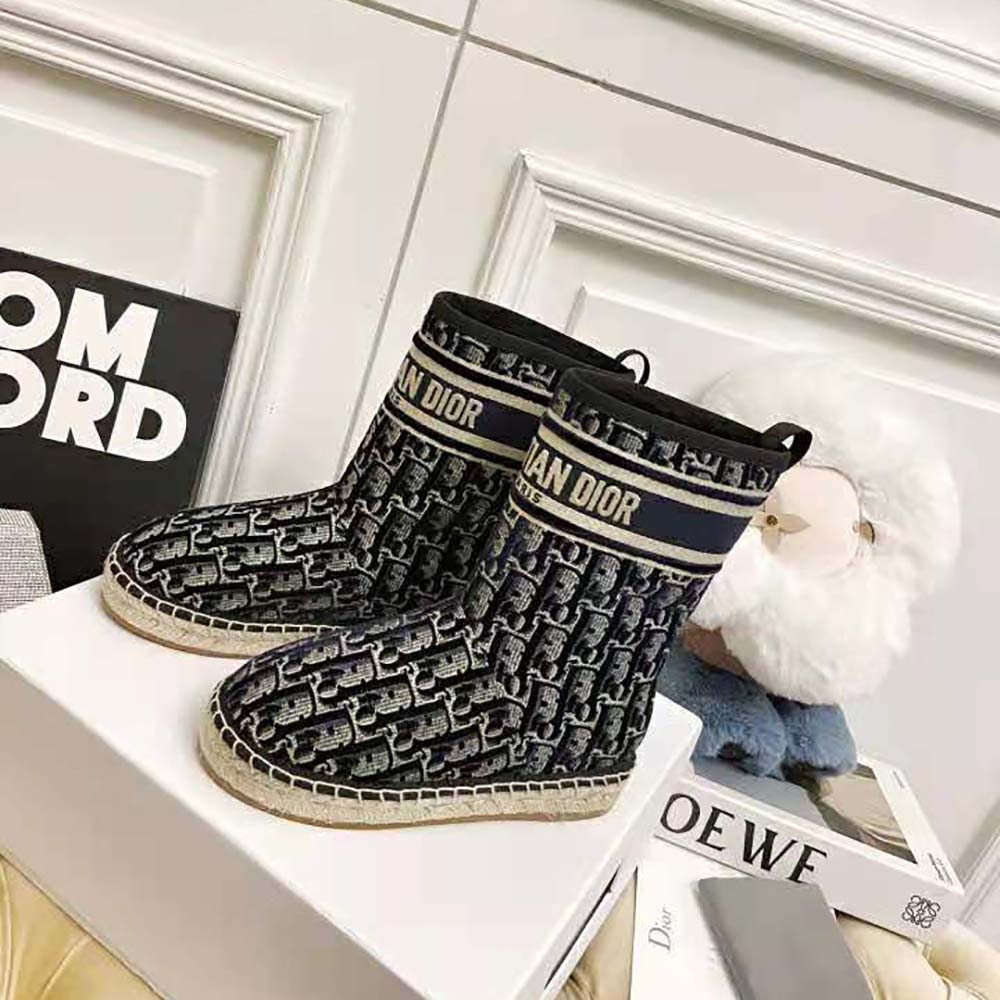 Close-up of blue velvet embroidery on Dior Granville ankle boot