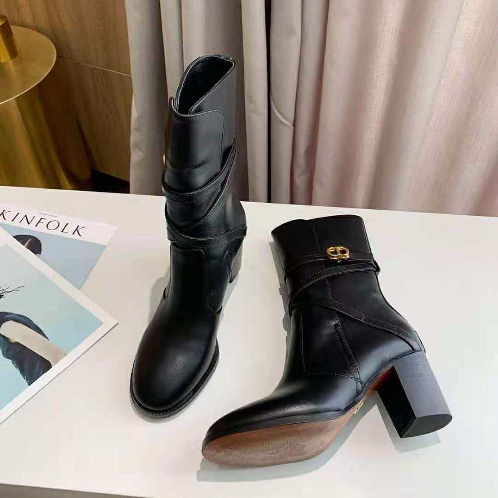 Front view showcasing 7cm heel of Dior Women Dior Empreinte Heeled Ankle Boot Black