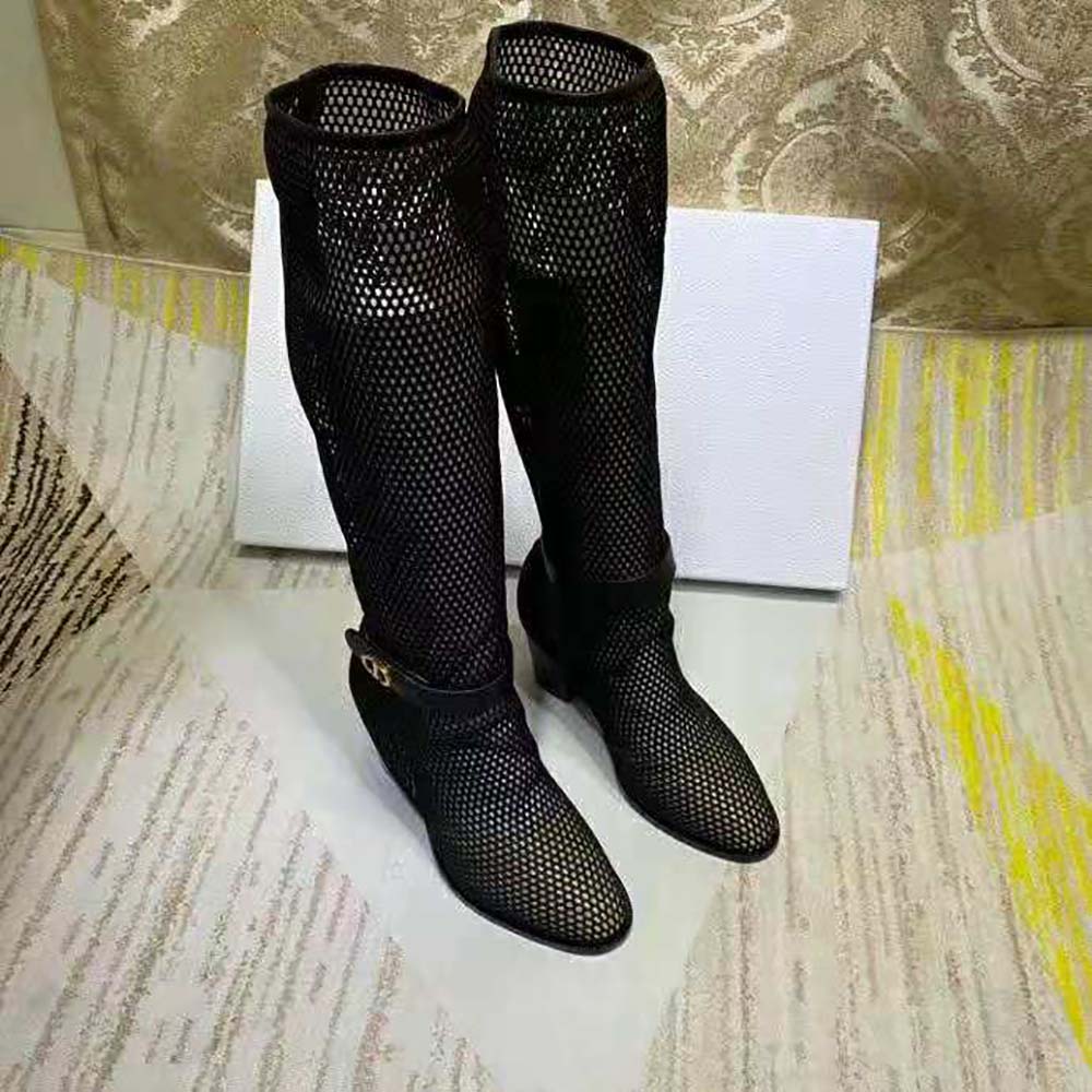 Close-up detail of mesh overlay and silver hardware on Dior heeled boot