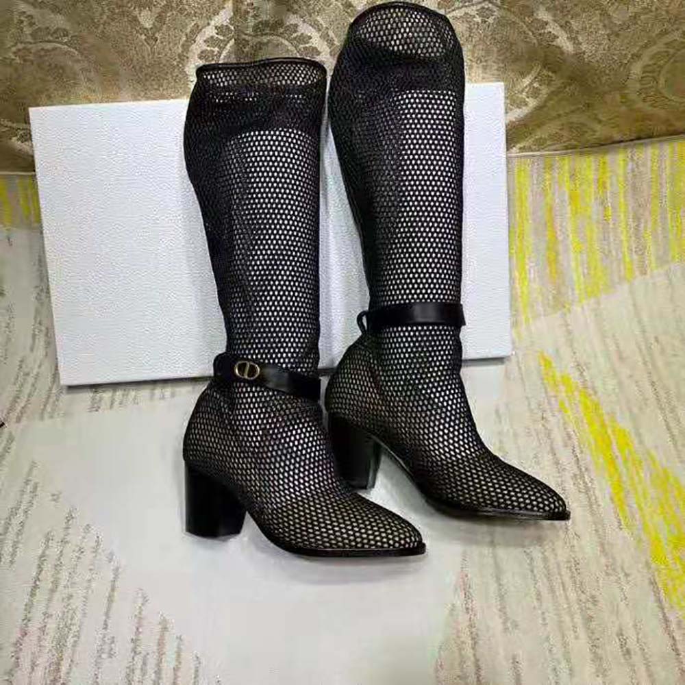 Side profile showing heel and silhouette of Dior Women Dior Empreinte boot