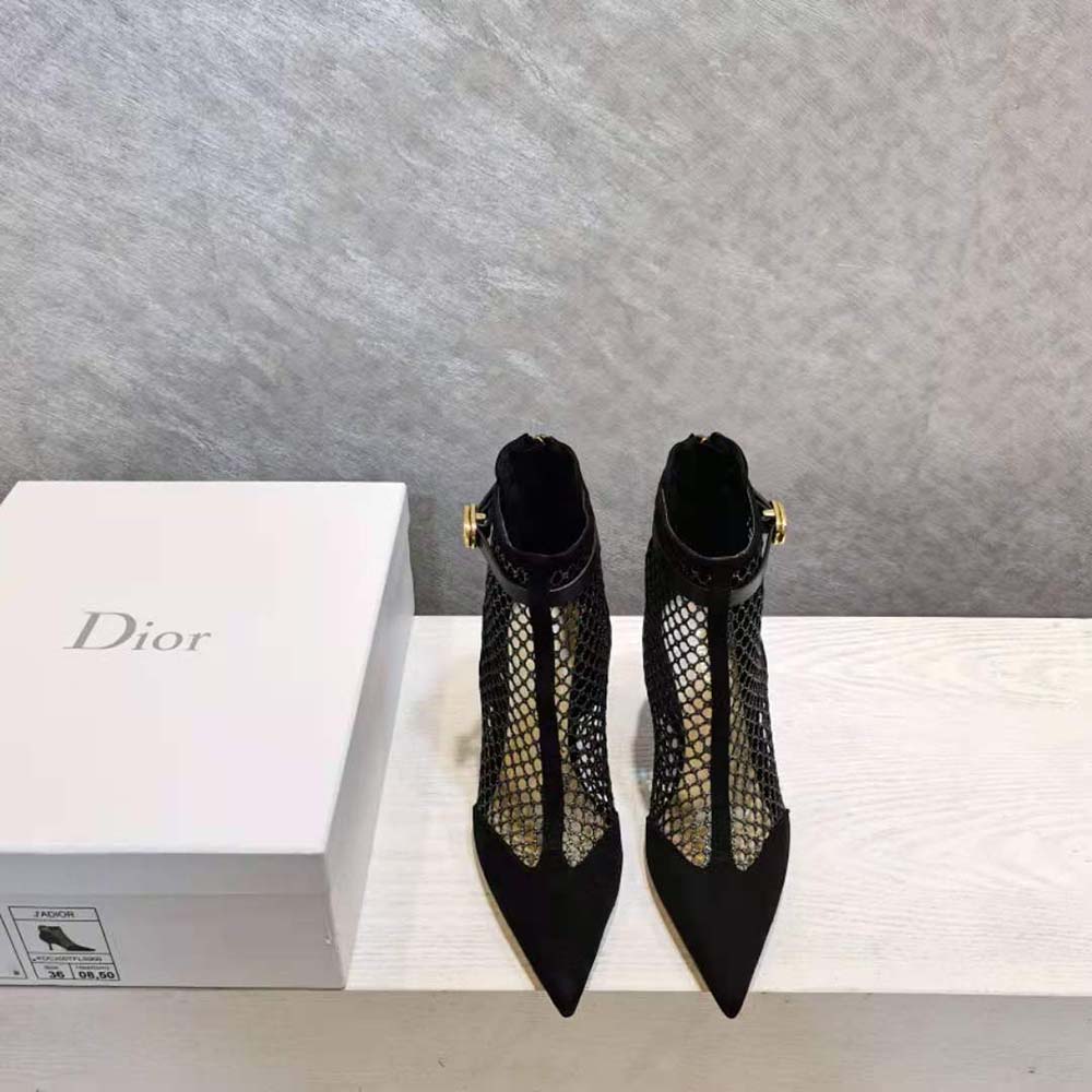 Close-up on silver Dior 'I' hardware on Dior Women Dior-I Heeled Ankle Boot