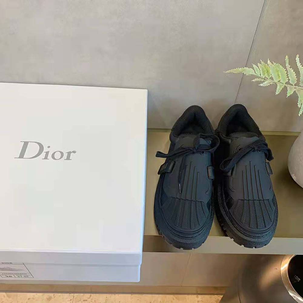 Top view showing laces and embossed Dior-Id logo on sneaker