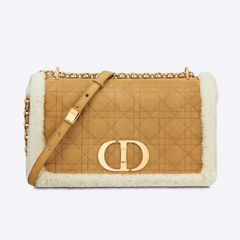 Front view of Dior Women Large 30 Montaigne Soft Bag in camel shearling