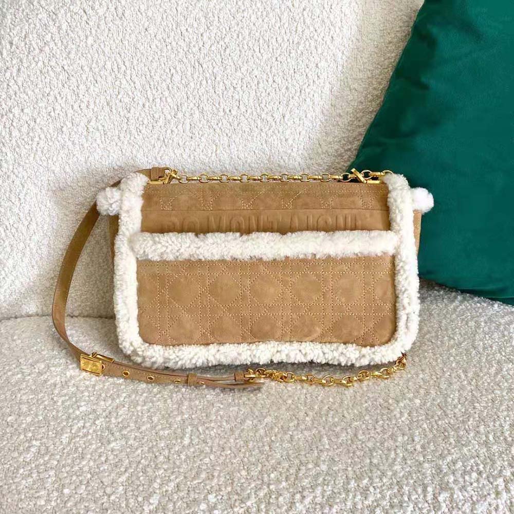 Side profile showing shape and shearling texture on Dior Women Large 30 Montaigne Soft Bag
