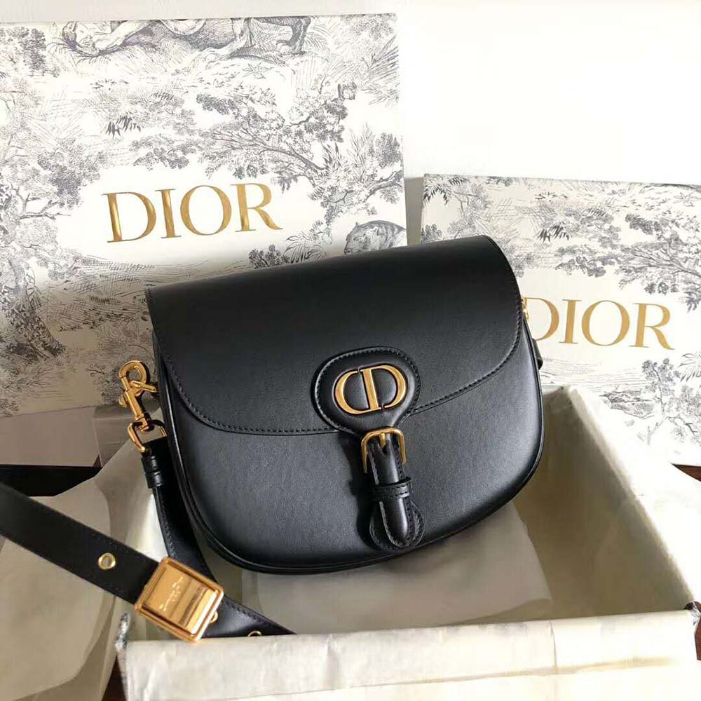 Close-up of black denim and silver hardware on Dior Bobby Bag