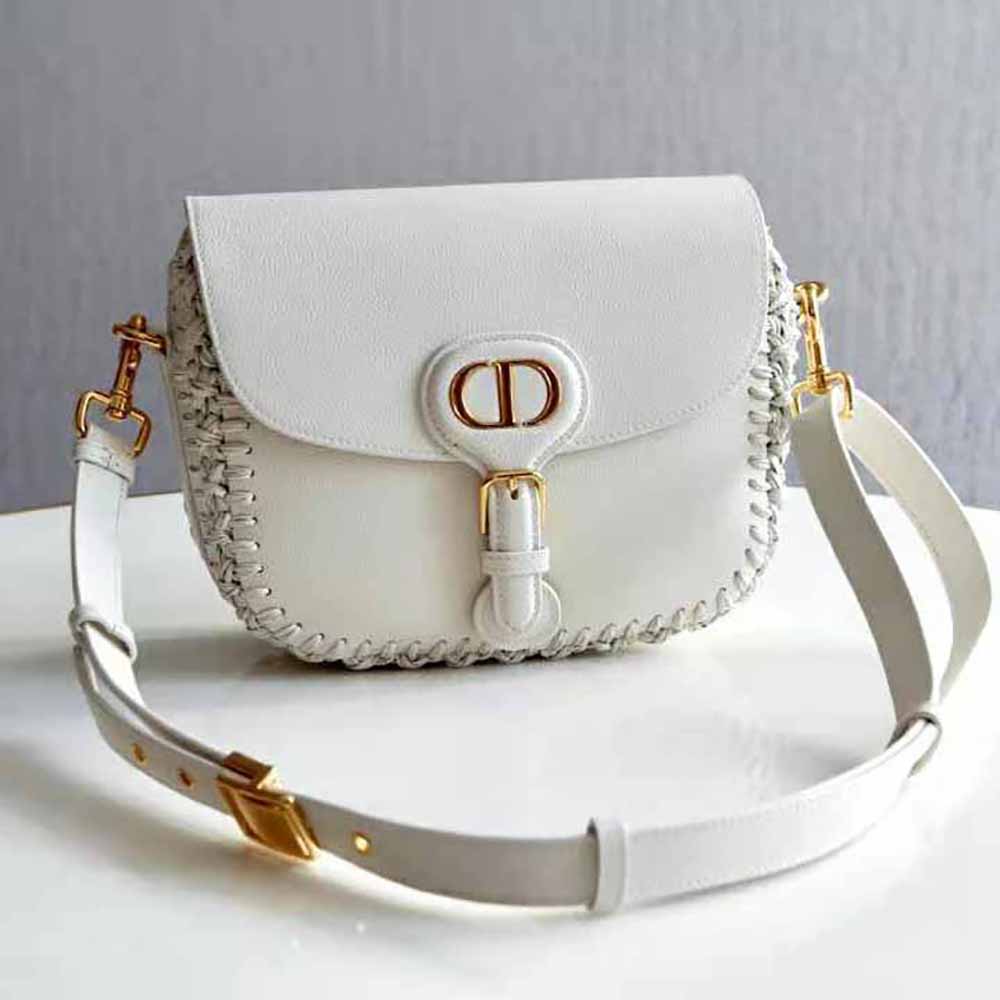 Side angle highlighting silhouette of Dior Women Medium Dior Bobby Bag in white leather