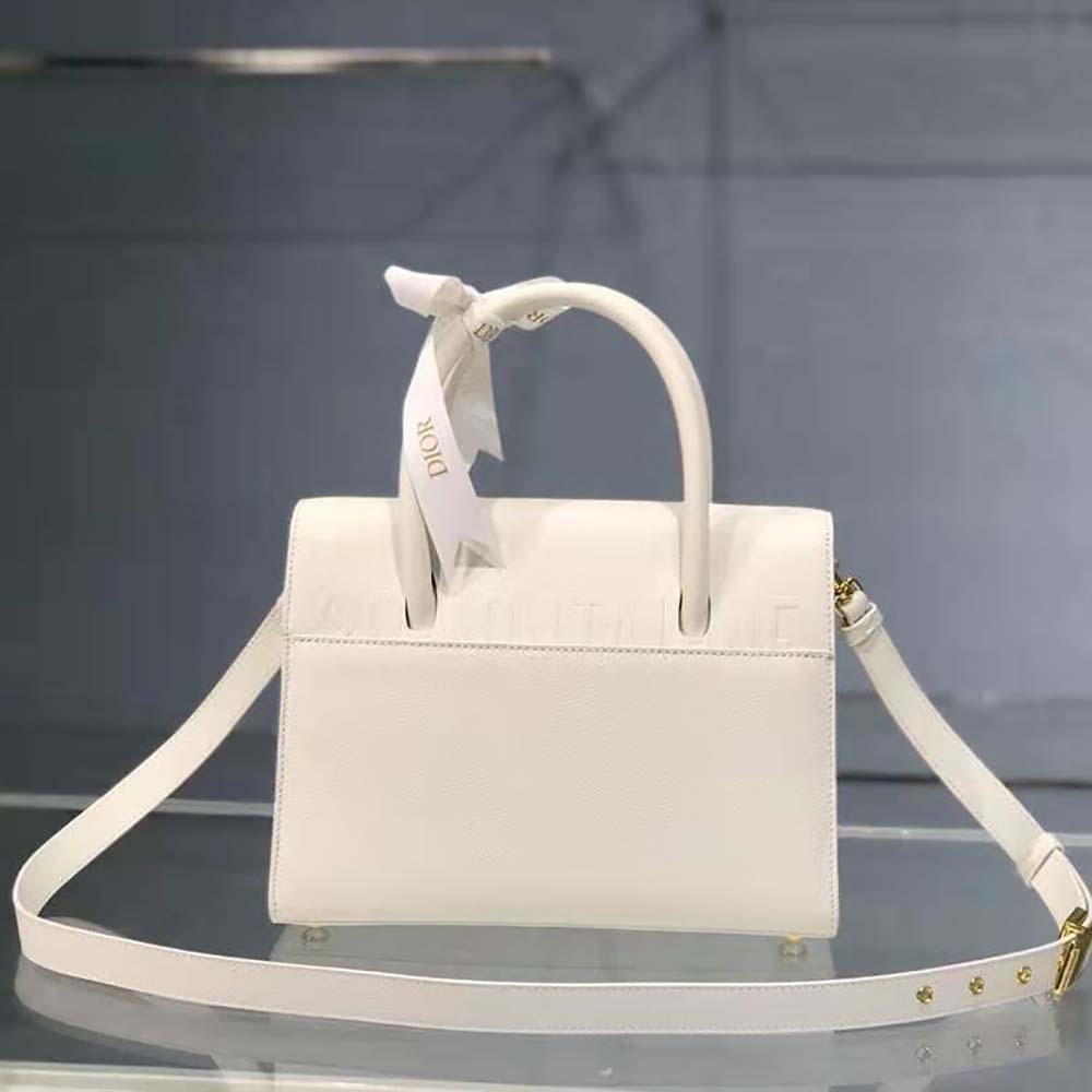 Interior shot of Dior Women Medium ST Honore Tote Latte with leather lining