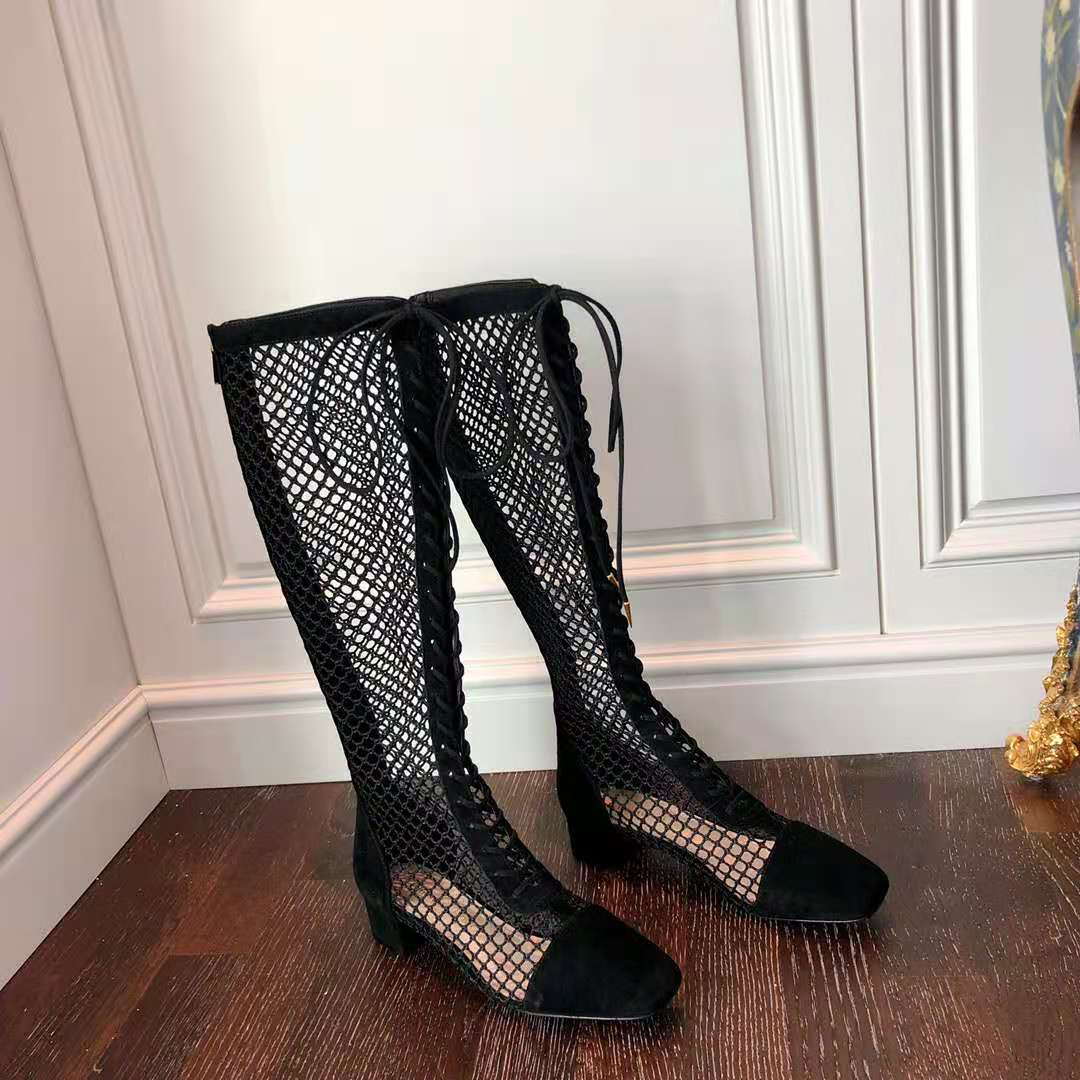 Close-up on silver hardware and suede texture of Dior Women Naughtily-D boot