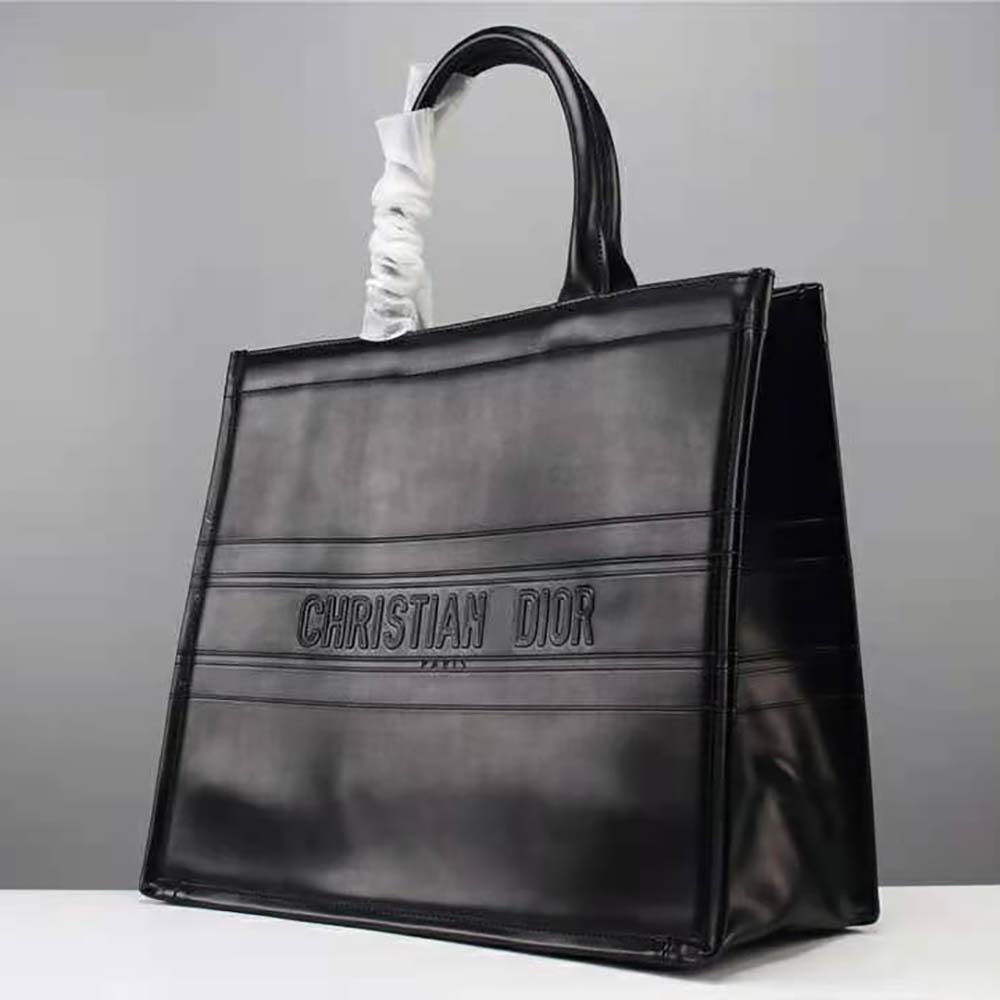 Side angle showing structured silhouette of Small Dior Book Tote Black Calfskin