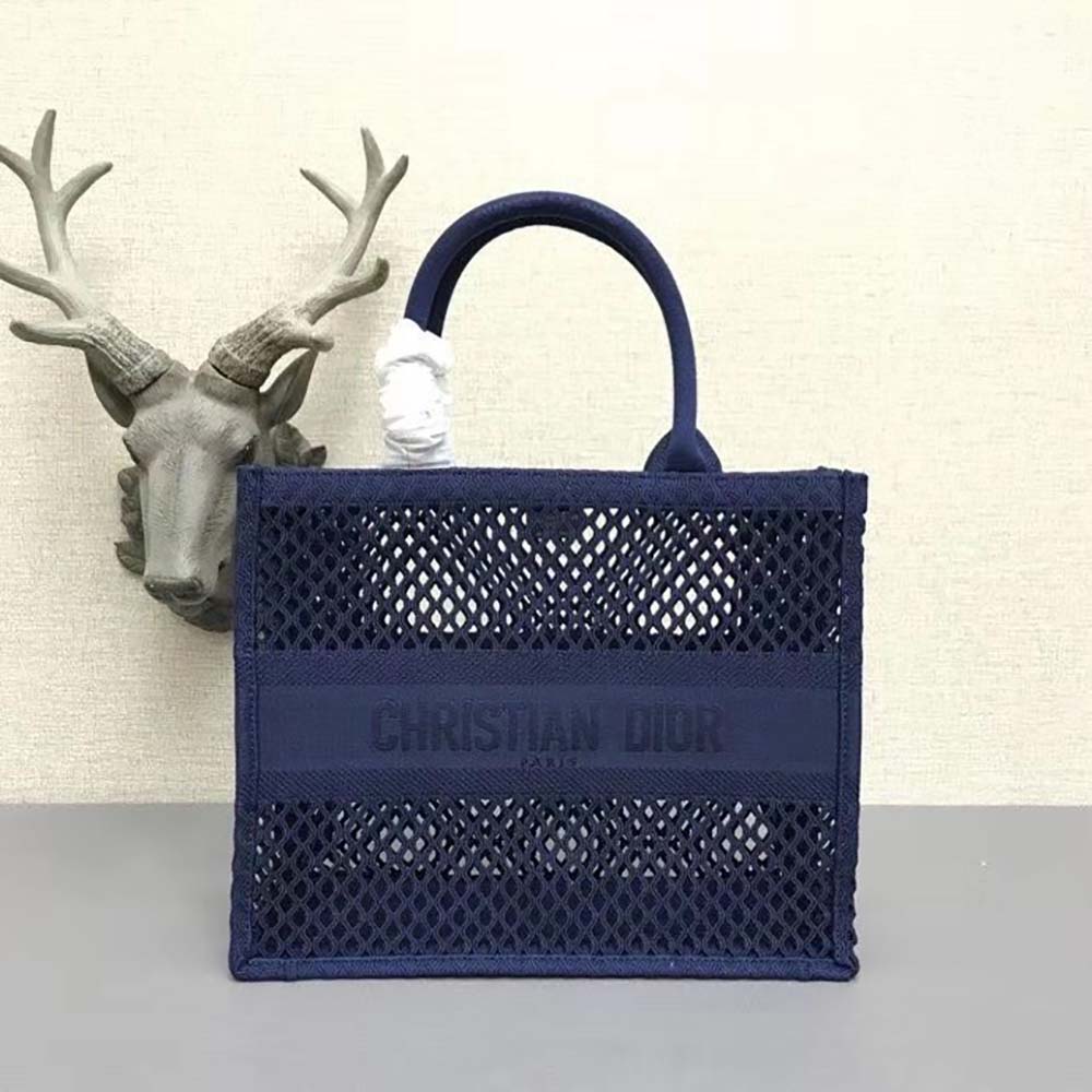 Close-up of navy mesh embroidery on Small Dior Book Tote