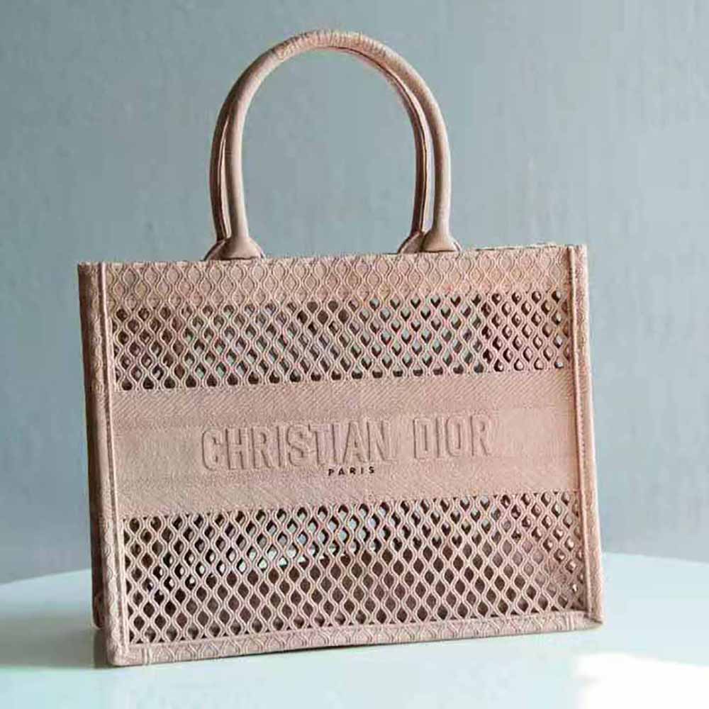 Close-up of pink mesh embroidery detail on Dior Small Book Tote