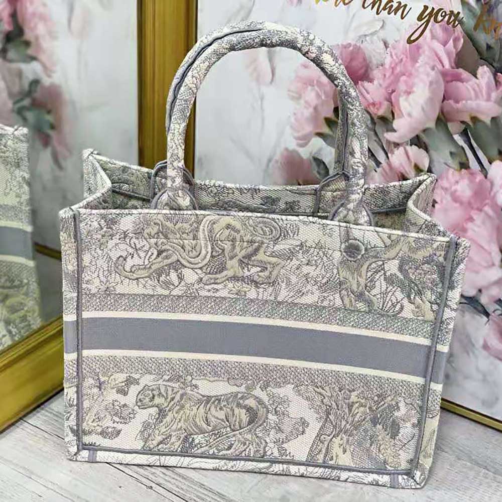 Side angle showcasing silver-tone hardware on Small Dior Book Tote Toile de Jouy Embroidery