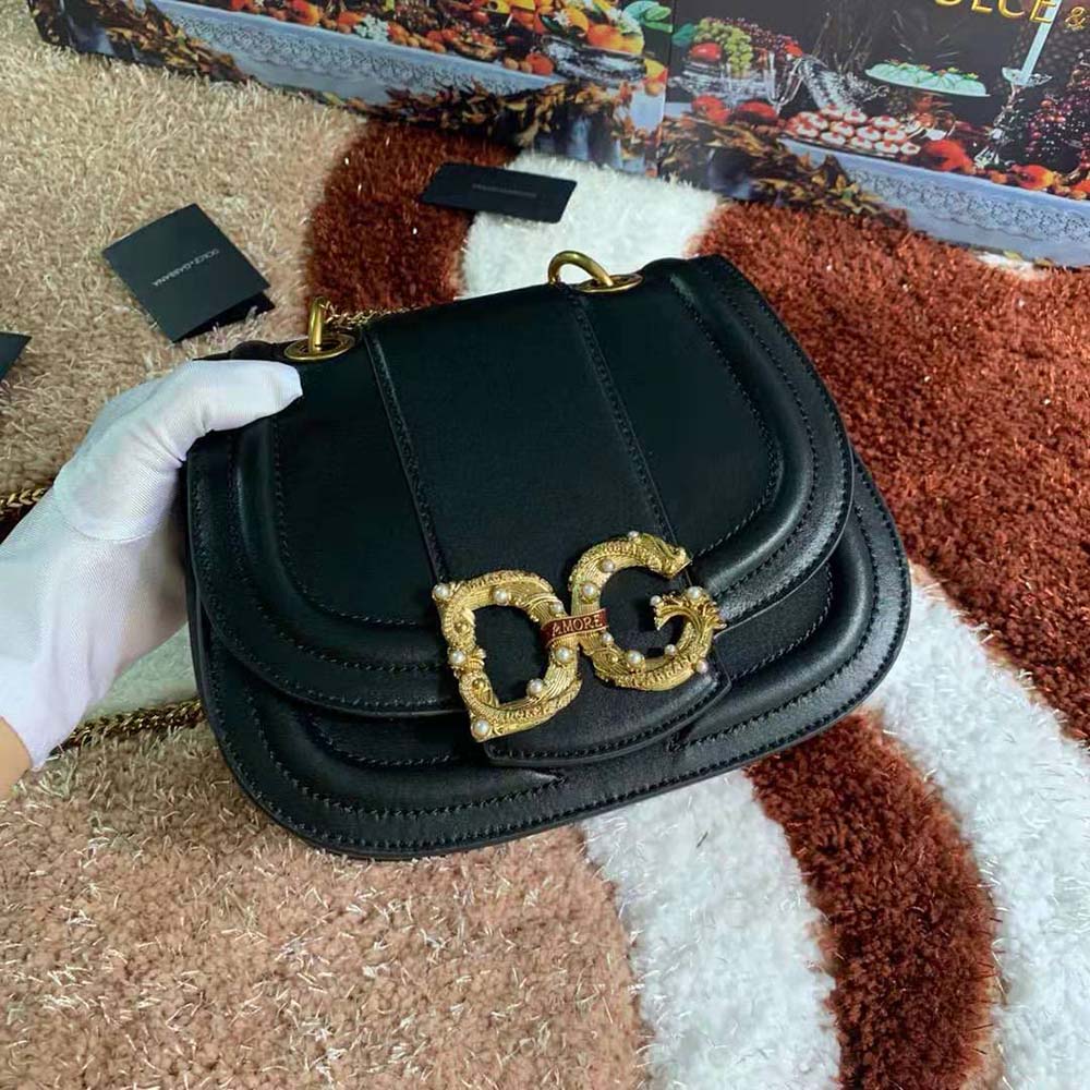 Side angle showing adjustable strap on Dolce Gabbana D&G Amore Bag