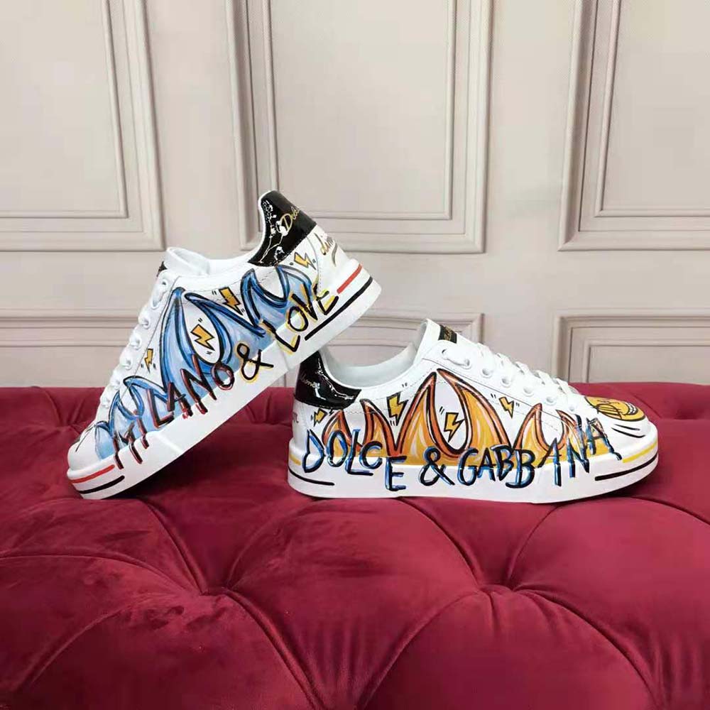 Close-up of D&G logo hardware on white Dolce Gabbana D&G Portofino Sneakers