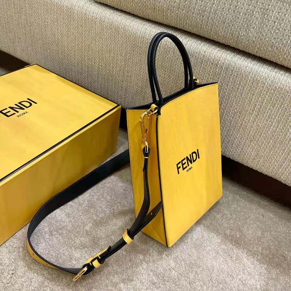 Side angle showing zipper and silver-tone hardware on Fendi bag