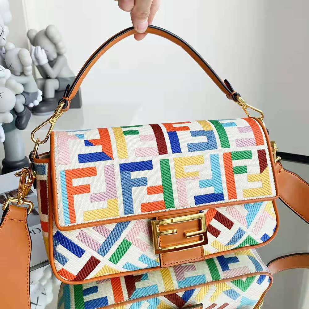 Side angle showing strap detail on Fendi Women Baguette Beige Canvas Bag