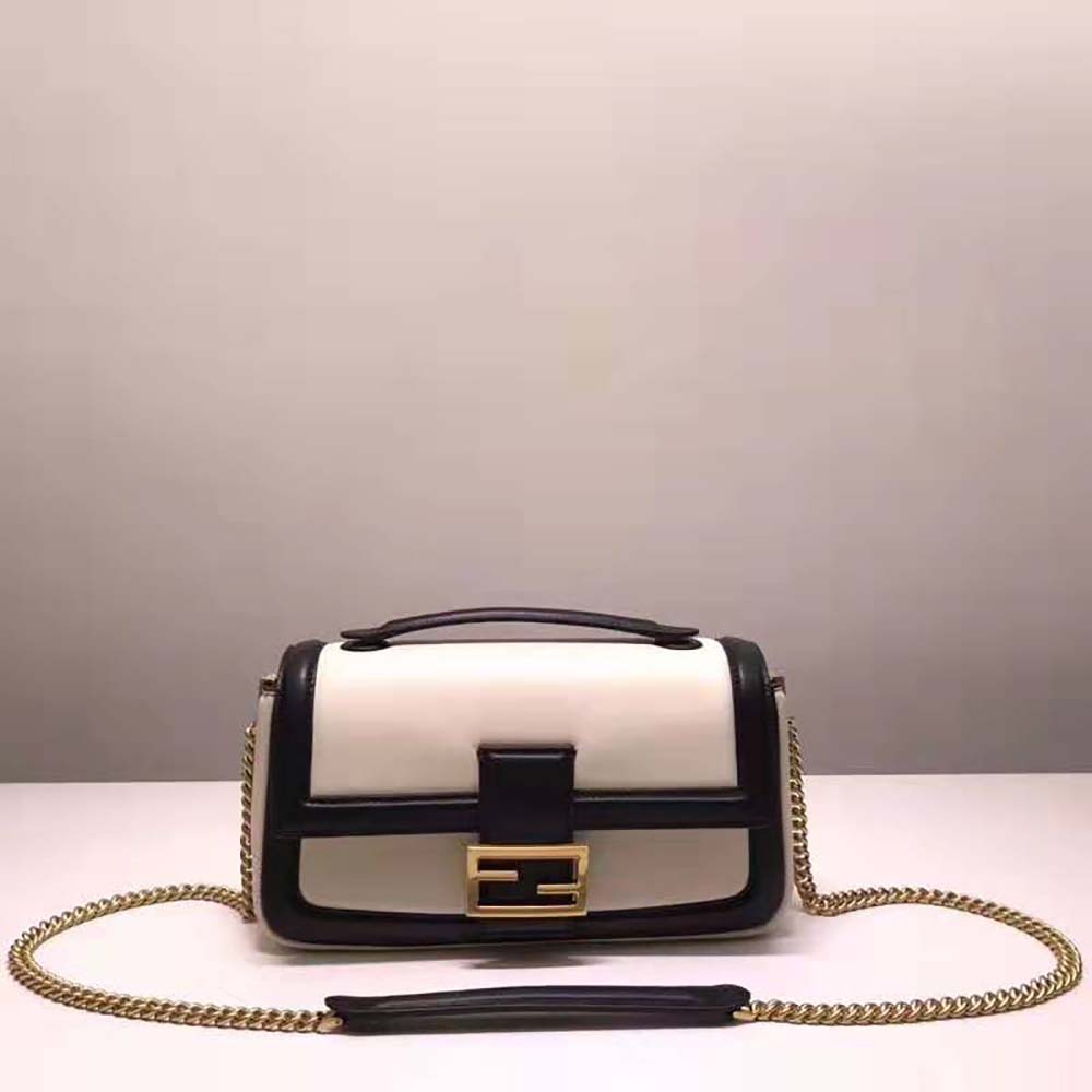 Side angle showing silhouette of Fendi Women Baguette Chain Black and White Nappa Leather Bag