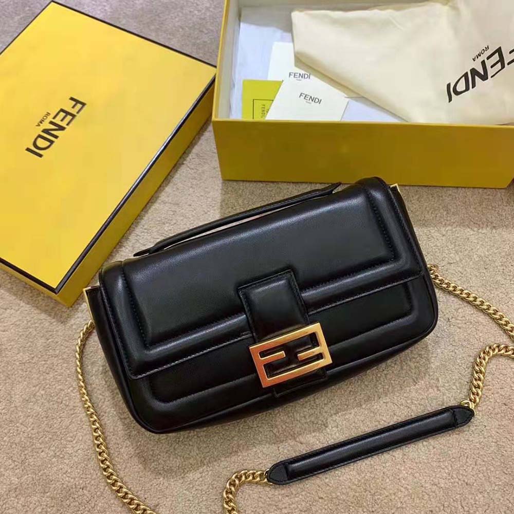 Close-up of gold-tone chain and smooth nappa leather detail on Fendi bag