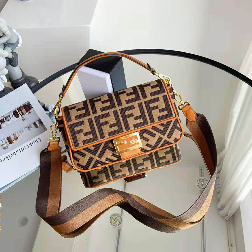 Close-up of gold-tone hardware on Fendi Women Baguette Green Canvas Bag