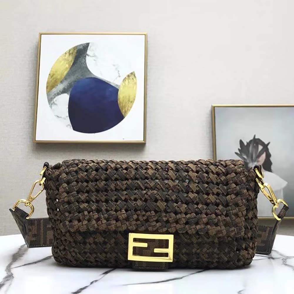 Close-up of gold-tone interlace hardware on Fendi Women Baguette Jacquard Fabric Interlace Bag