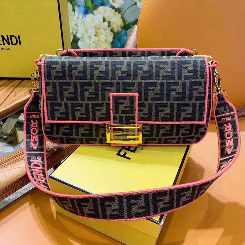 Close-up of gold-tone closure and Roma/Amor fabric detail on Fendi bag