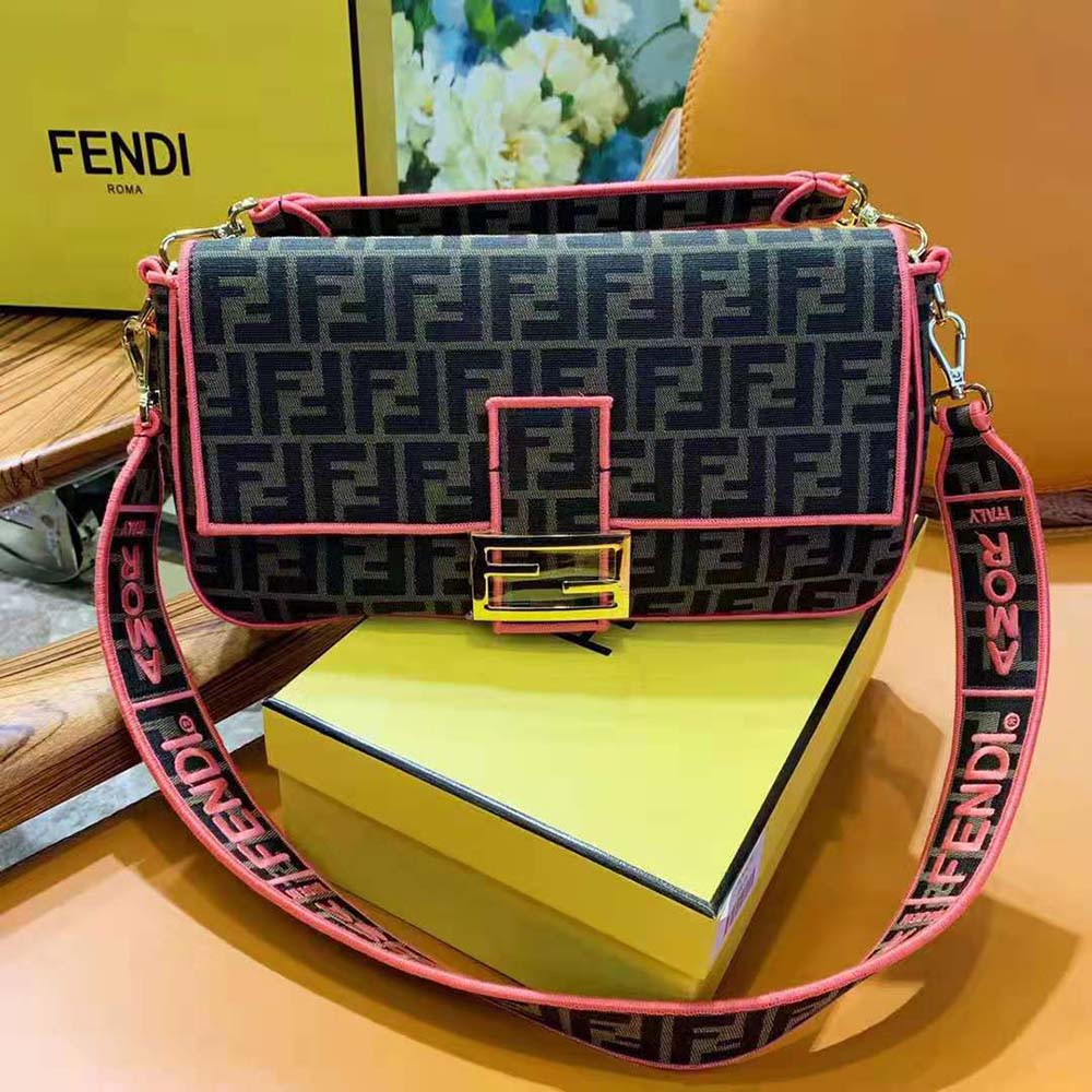 Side angle showing silhouette and shoulder strap of Fendi Women Baguette bag