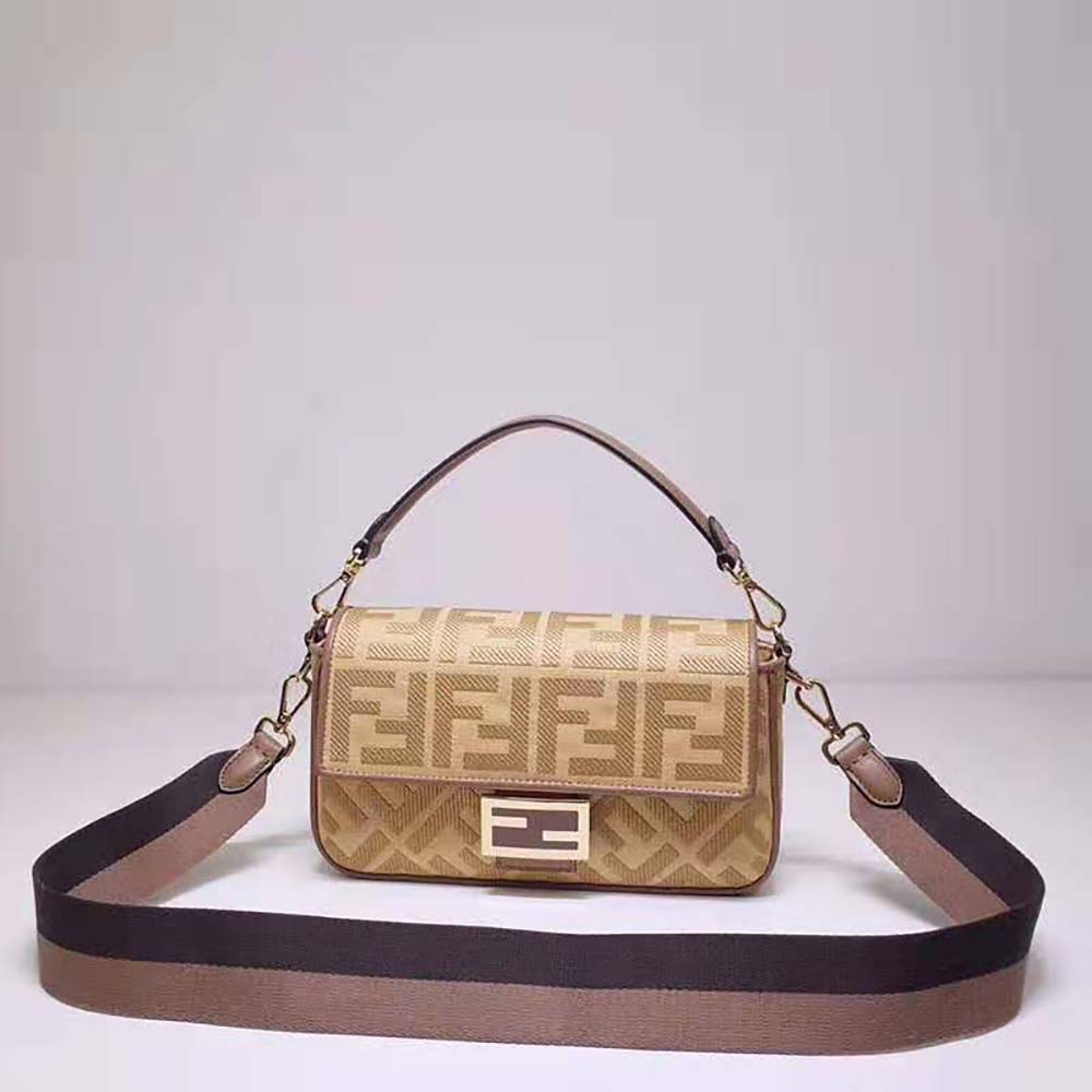 Close-up of gold hardware and Fendi logo on Natural Straw Bag