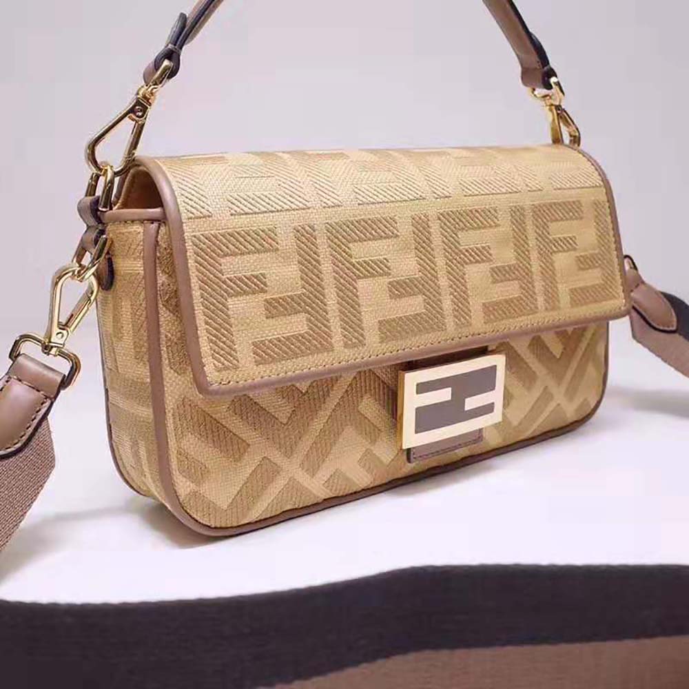 Side angle showing compact silhouette of Fendi Women Baguette Natural Straw Bag