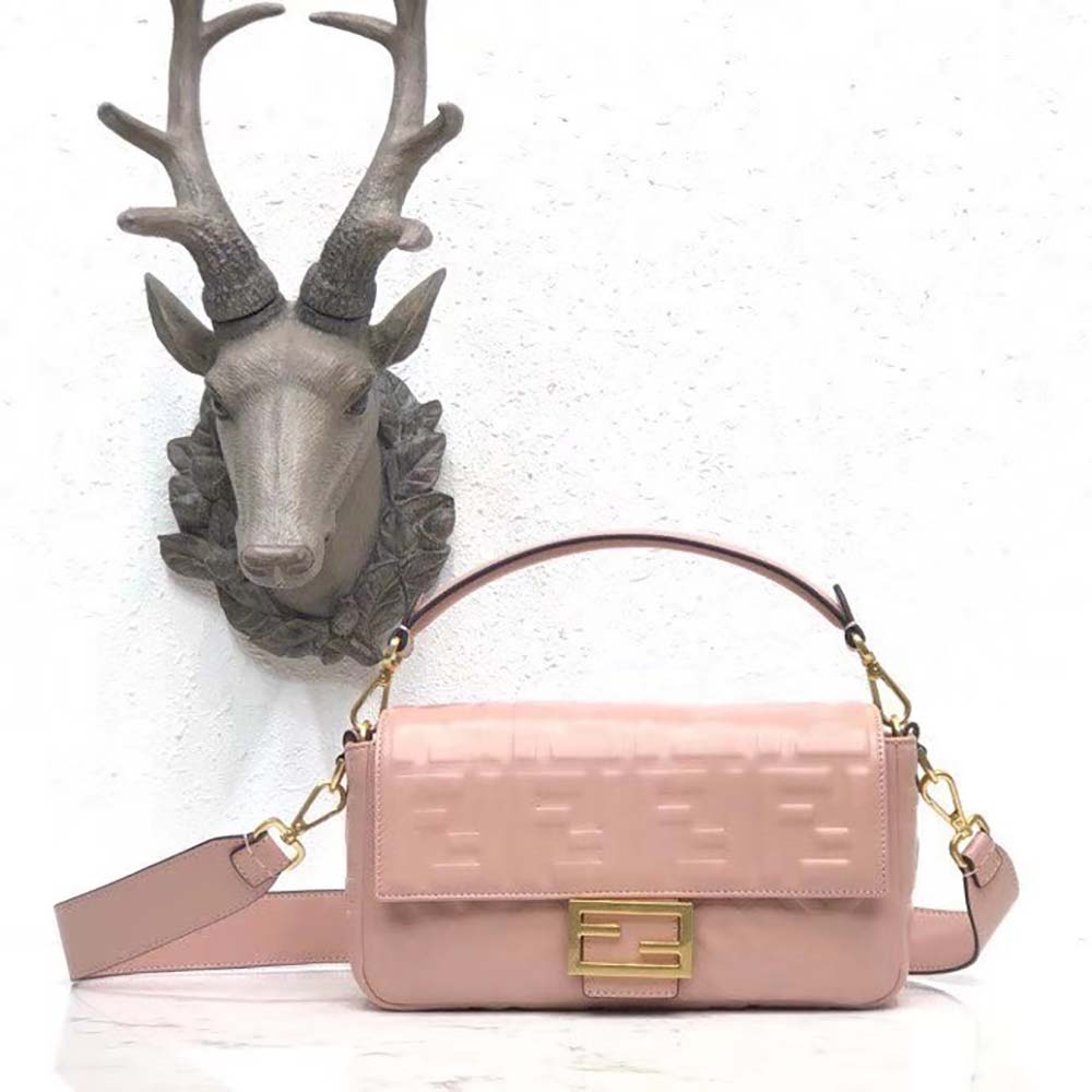 Close-up of gold-tone hardware on Fendi Women Baguette Pink Leather Bag