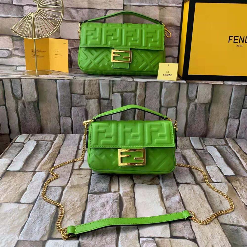 Close-up of gold hardware on Fendi Women Baguette Soft Nappa Leather Bag-Green