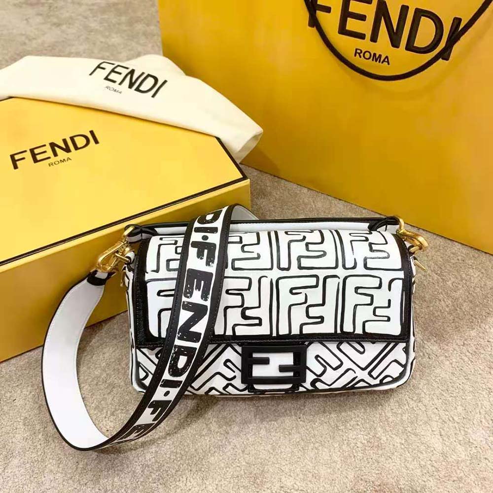 Close-up detail of FF print and gold-tone closure on Fendi bag
