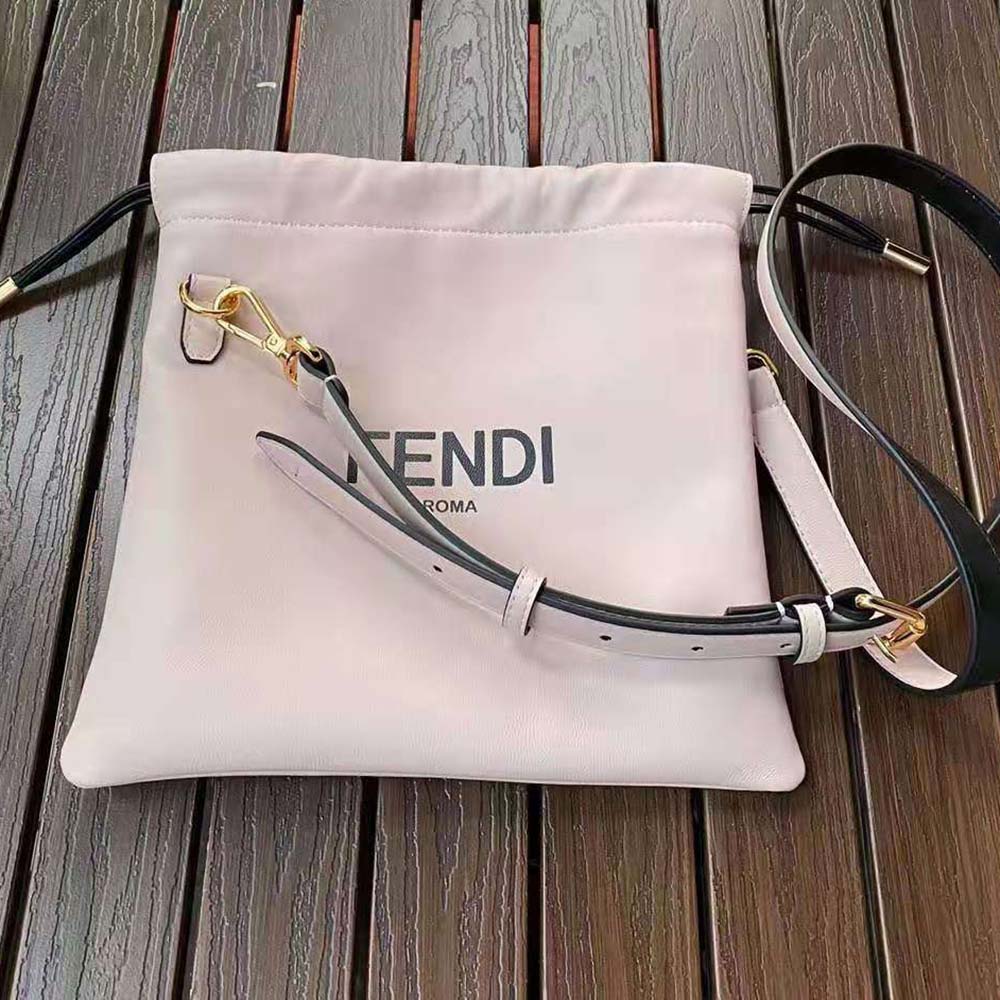 Side angle showcasing zipper and leather texture on Fendi Small Pouch